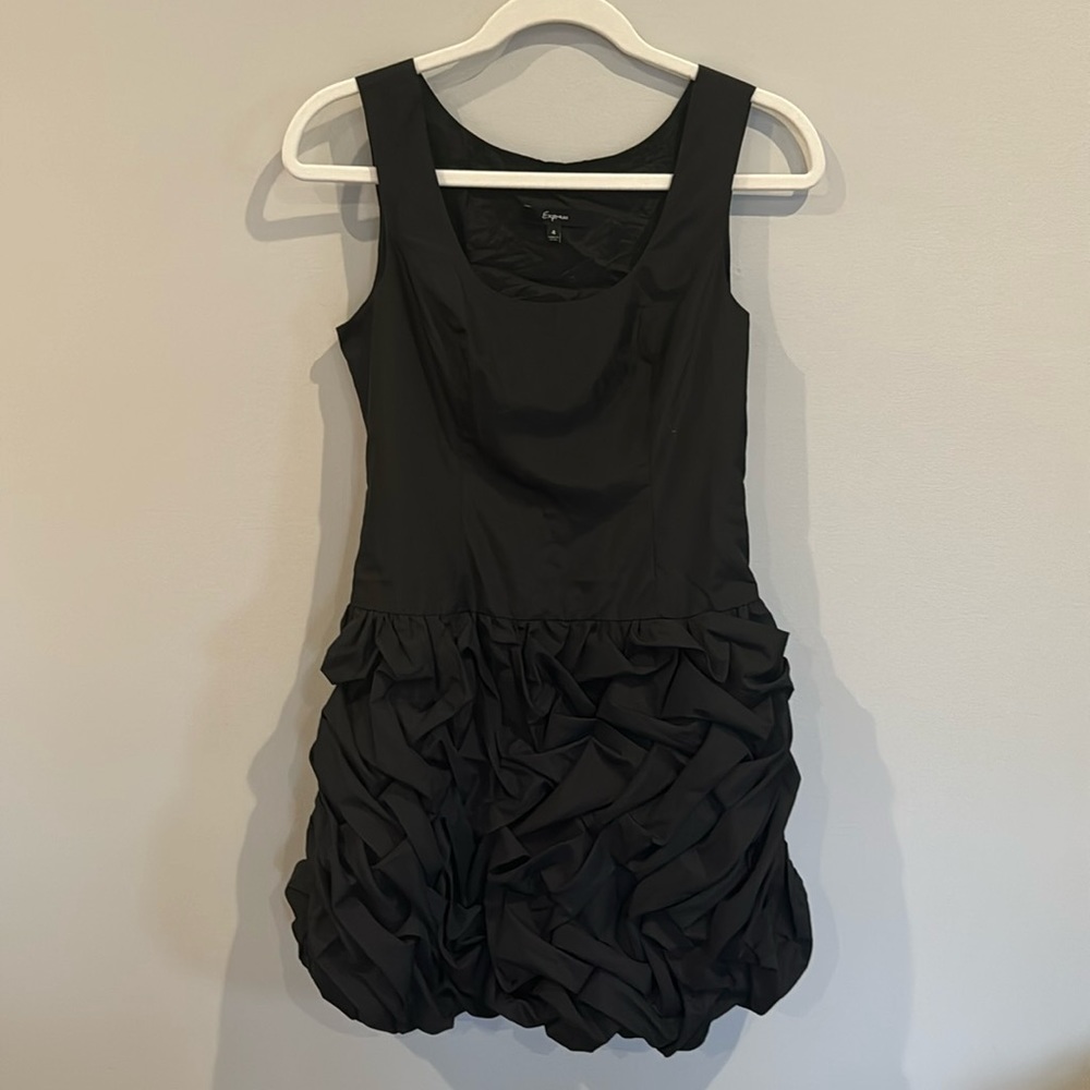 Black tight on top bubble bottom dress. Size 4 express